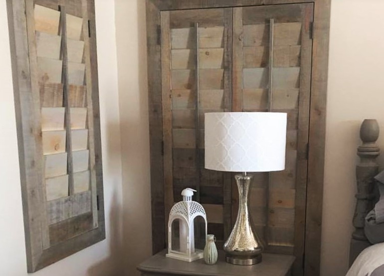 San Antonio bedroom with reclaimed wood shutters.